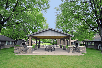 Outdoor kitchen pavilion with grills
